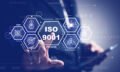 concepts about iso 9001. Businessman pressing on virtual screen about quality management system. Customer Focus, Involvement of People, Process Approach, System Approach. QMS.